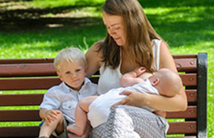 Mother breast feeding